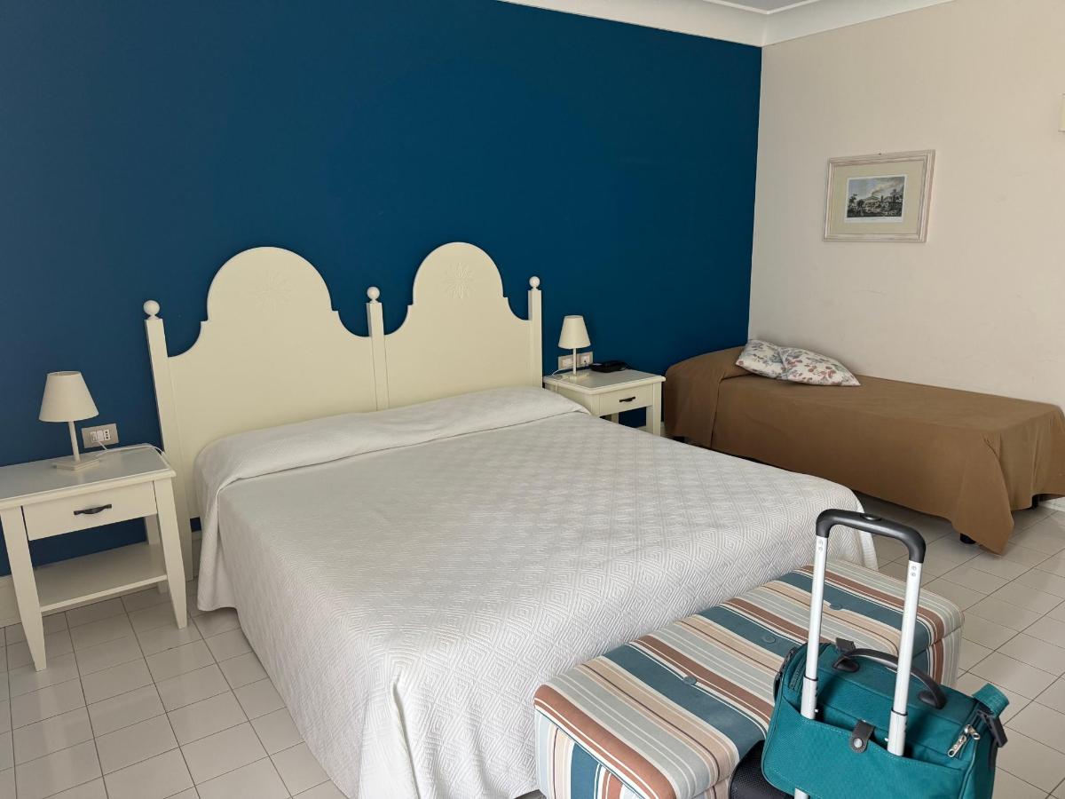 Letto o letti in una camera di Hotel Danieli Pozzallo