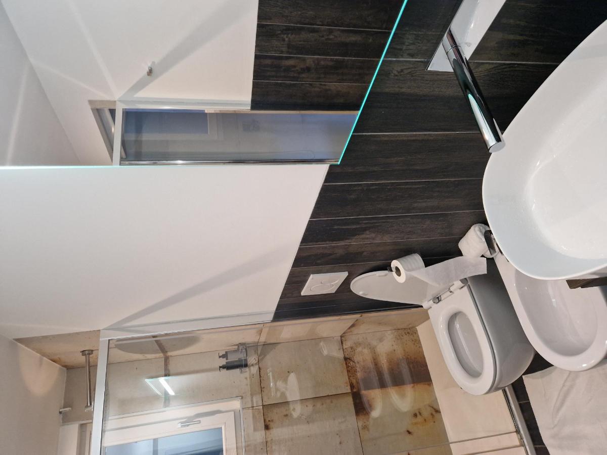 Bagno di Le Stanze del Lago Suites & Pool