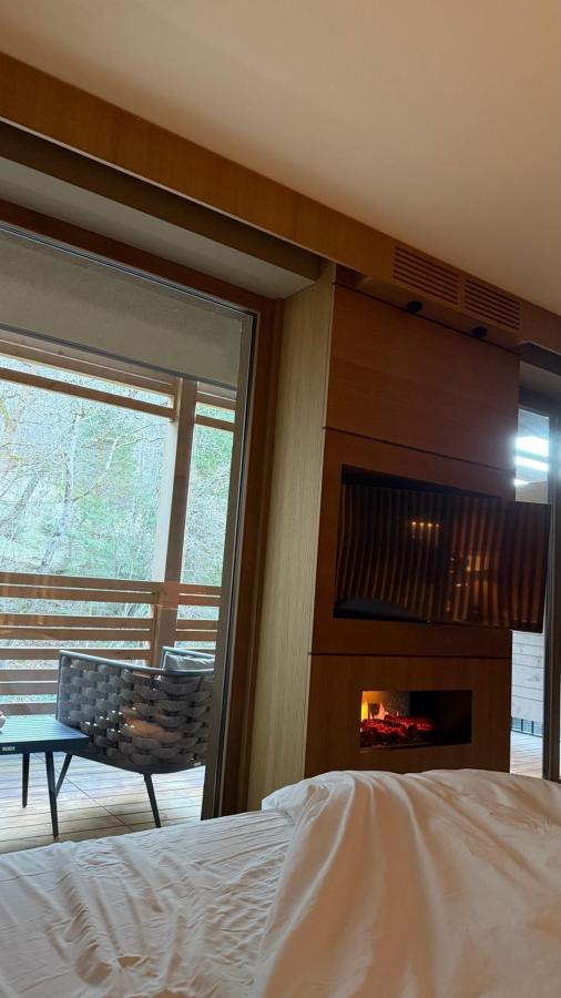 Letto o letti in una camera di Lefay Resort & SPA Dolomiti