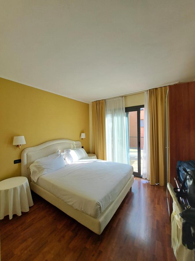 Letto o letti in una camera di Admiral Hotel Villa Erme