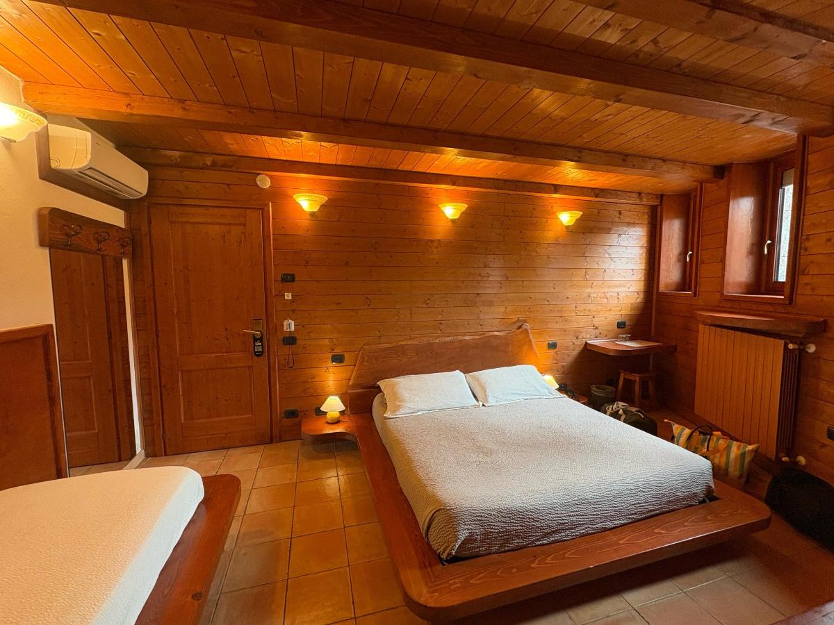 Letto o letti in una camera di Resort San Pellegrino Terme