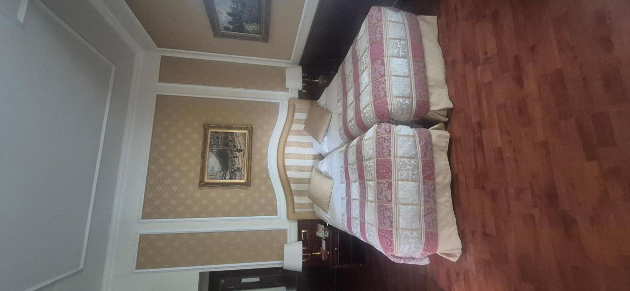 Letto o letti in una camera di Hotel Simplon