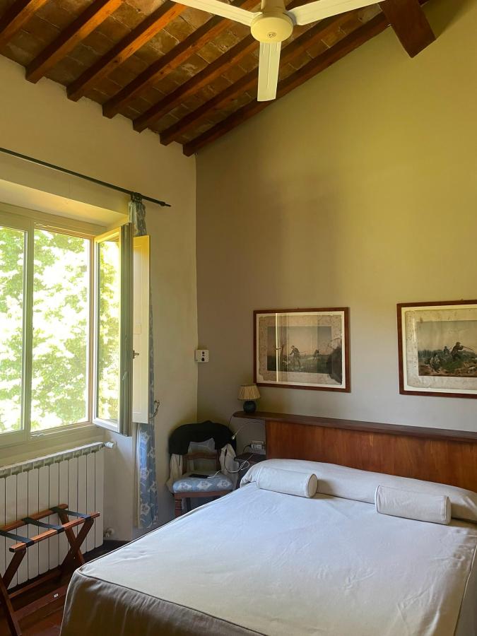 Letto o letti in una camera di Rovezzano B&B