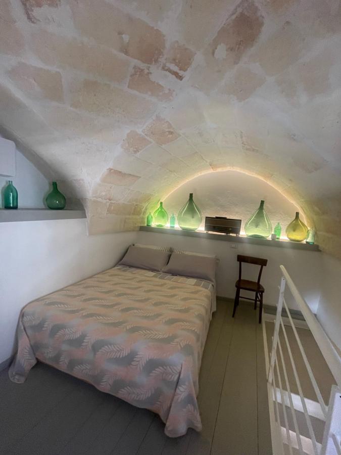 Letto o letti in una camera di Corte Giotto Exclusive House