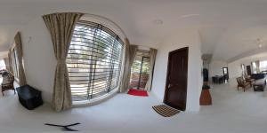 Fotografie z fotogalerie ubytování Gintara Beach Homestay by evaddo v destinaci Kalyānpur
