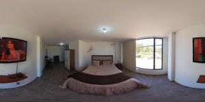 Fotografie z fotogalerie ubytování Hotel Suite Central Park Tababela v destinaci Quito