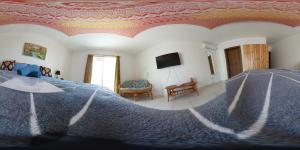 Foto dalla galleria di All Nations Holiday Home a Għajnsielem