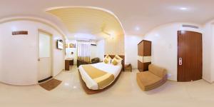 Foto sihtkohas Mysore asuva majutusasutuse Aishwarya Suites galeriist
