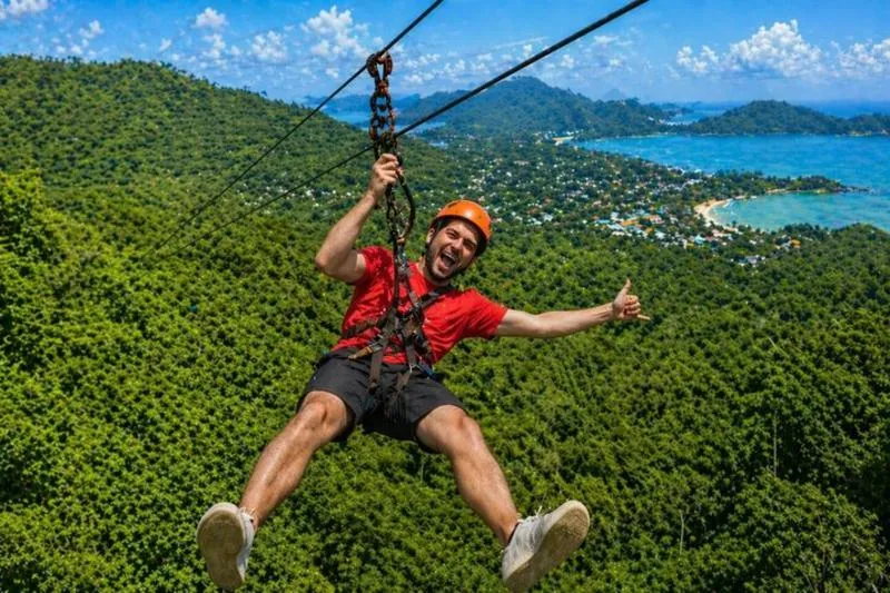 Featured tour with 12 reviews: Jungle Zipline Adventure: 10 Cables, Tree Bridge Bar & Sea Views